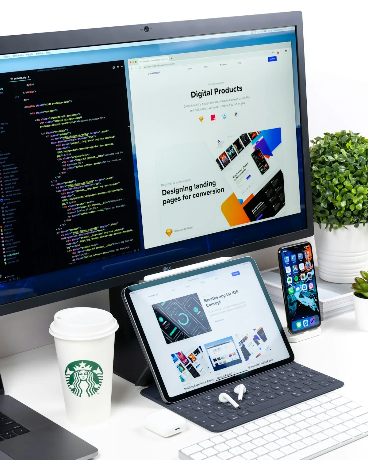 Professional web designer reviewing WordPress website layouts on dual screens in a London studio